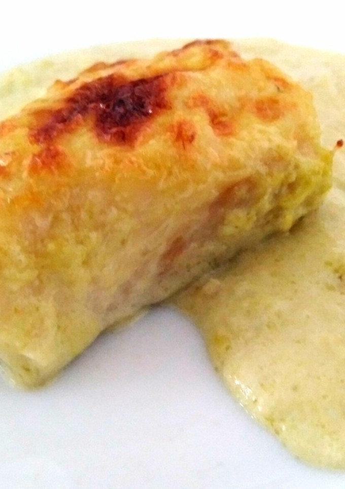 Una foto de Lomos de bacalao con salsa puerros