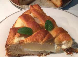 Una foto de Tarta de queso y peras