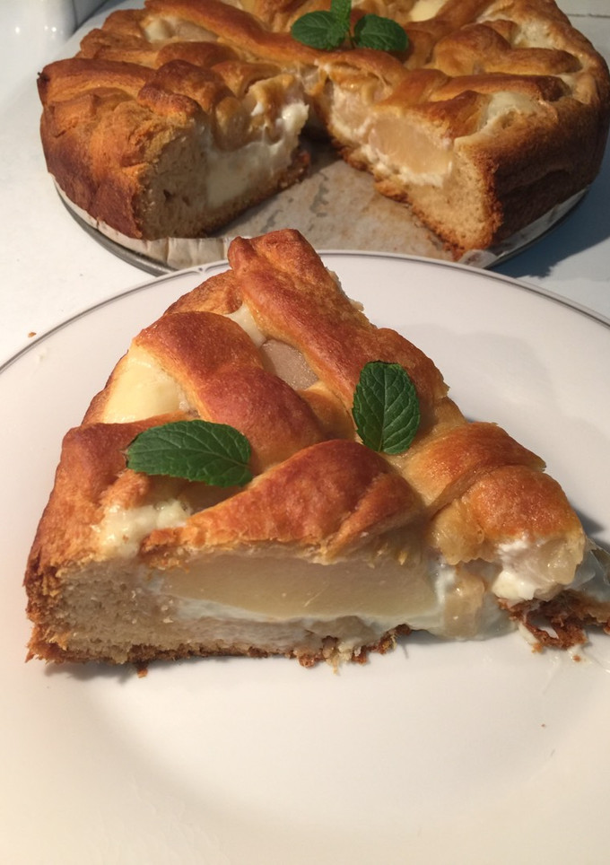 Una foto de Tarta de queso y peras