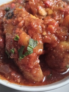 A picture of Roasted Tomatoes and Air fried chicken sauce.