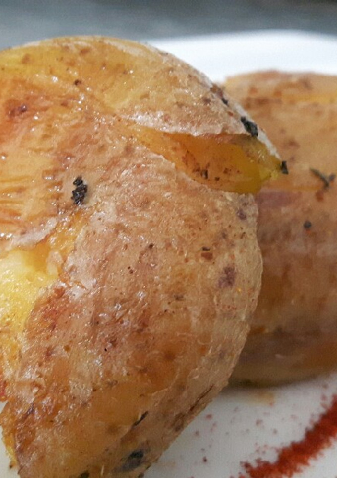 Una foto de Patatas rotas