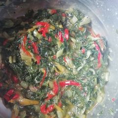 A picture of Spinach with robbot peppers.
