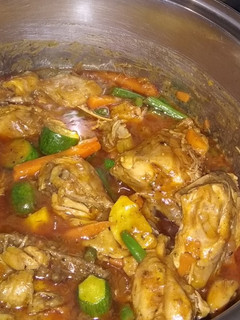 A picture of Spicy chicken with vegetable stew.