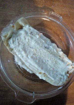 Una foto de Canelones de arvejas y zanahorias con postre