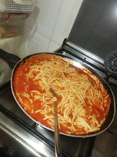 صورة لوصفة معكرونه المقلاه بالصلصه والكاتشب لذيذه