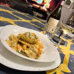 Foto di Ravioli di Gamberi e Burrata con Pesto di Pistacchi