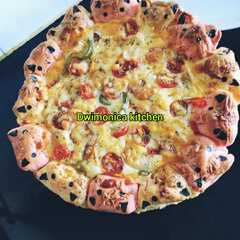 A picture of Pizza hello kitty #pizzahomemade.