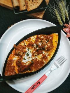 A picture of Awadhi Chicken Korma.