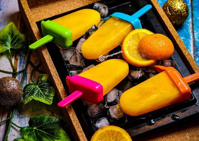 Orange lollies|Orange Popsicles Recipe by Yum Cyclopedia - Cookpad