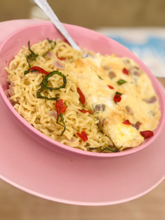 A picture of Sharp sharp Noodles with egg.