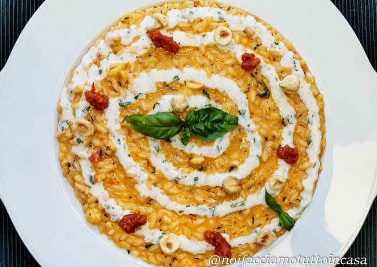 Risotto con Pesto di Pomodorini Confit e Stracchino