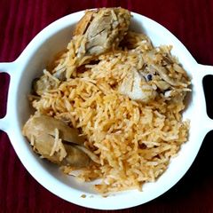 A picture of Butter Chicken biryani.