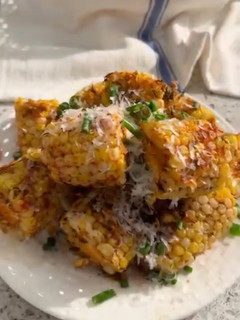 A picture of Garlic and Parmesan Buttered Corn.