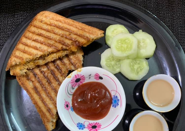 Chole bread sandwich with masala chai and cucumber