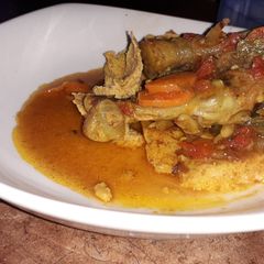 A picture of Chicken feet stew with Pumpkin bread.