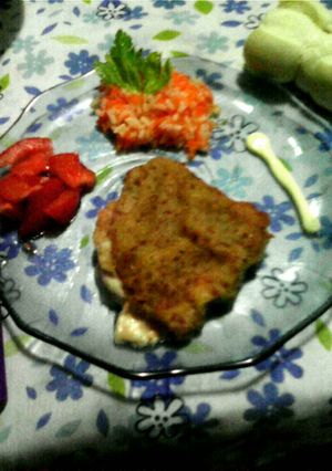 Una foto de Milanesas rellenas de jamón y queso