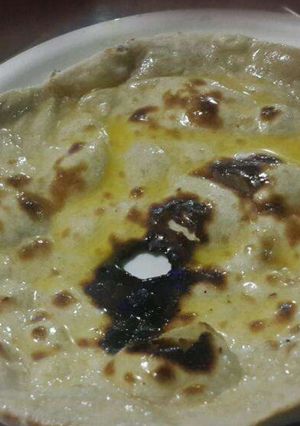 A picture of Butter Naan on Tawa.