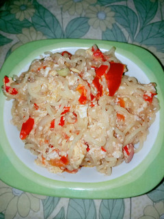 A picture of Indomie with mashed egg.