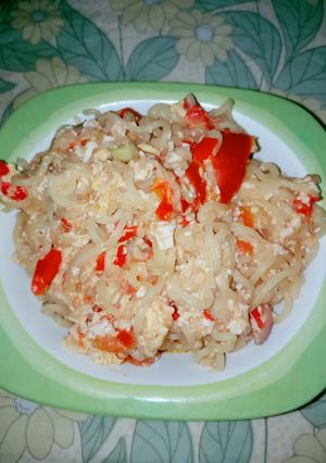 A picture of Indomie with mashed egg.