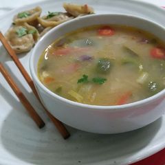A picture of Chicken soup with dumpling.