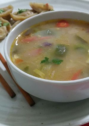 A picture of Chicken soup with dumpling.