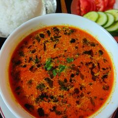 A picture of Saaru with Coconut Milk.