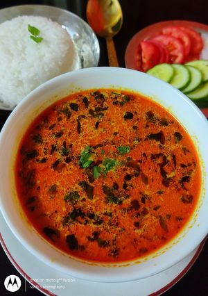 A picture of Saaru with Coconut Milk.