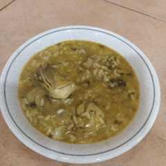 Una foto de Arroz meloso con alcachofas MCC