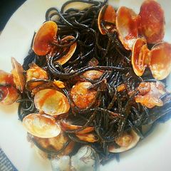 A picture of Mediterranean black pasta with clams, just delicious!.