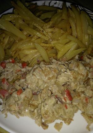 A picture of Chips and scramble eggs.
