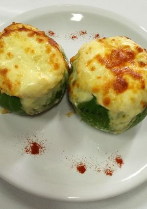 Una foto de Zapallitos Rellenos En Salsa De Tomate