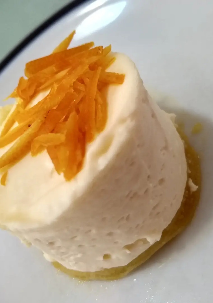Una foto de Creme bruleé de naranja