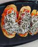 Tosta de pimientos con su pilpil y gulas en TMX