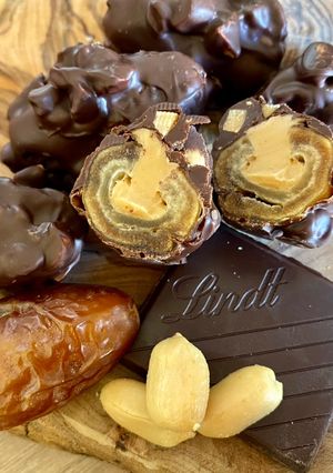A picture of Vegan Stuffed Dates with Peanut Butter and Dark Chocolate with Sea Salt.