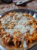 Homemade pan pasta pizza with lots of mayonnaise