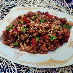 A picture of Bread Upma with beetroot & sesame seeds.