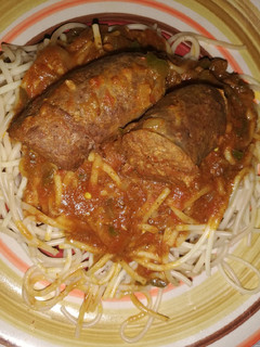 A picture of Spaghetti and relish with wors.