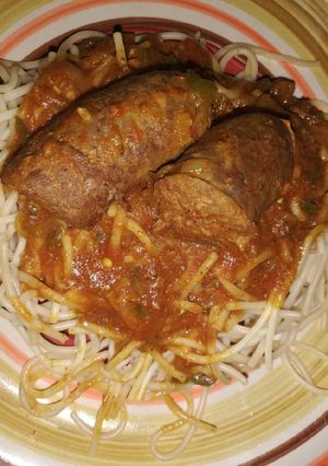 A picture of Spaghetti and relish with wors.