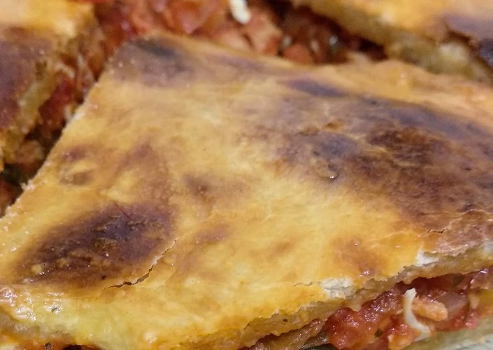 Cómo Preparar  Empanada gallega de atún y almejones con masa casera