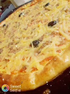 صورة لوصفة بيتزا بالعجانة السحرية 🍕