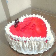 Pineapple cake with strawberry gel A picture of Pineapple cake with strawberry gel.