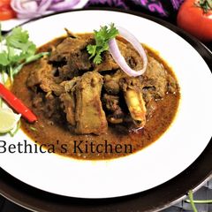 A picture of Kolhapuri Mutton Curry.