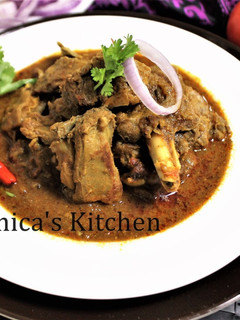 A picture of Kolhapuri Mutton Curry.