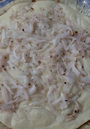 Una foto de Pre pizza Soufflé de Cebolla