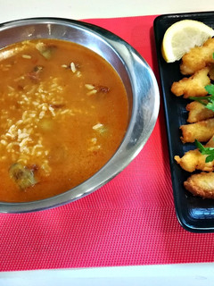 Una foto de Arroz con alcachofas y bacalao