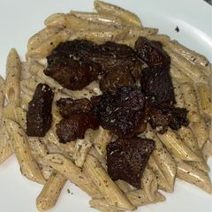 A picture of Garlic parm pasta steak.