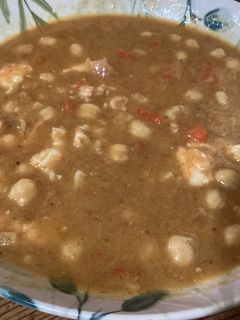 Una foto de Garbanzos con langostinos