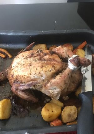 A picture of Roast chicken with vegetables.