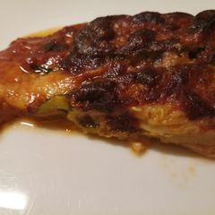 Zucchine, ham and scamorza parmigiana A picture of Zucchine, ham and scamorza parmigiana.
