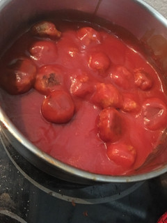 Una foto de Albóndigas de calabacín en salsa de tomate